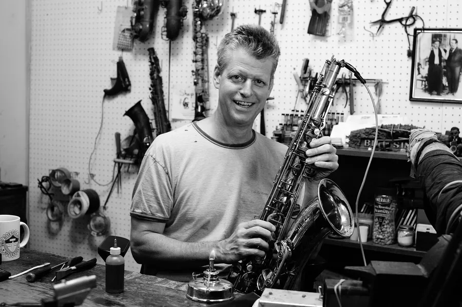Legendary saxophone repair technician Bill Singer in his old West 43rd Street shop.