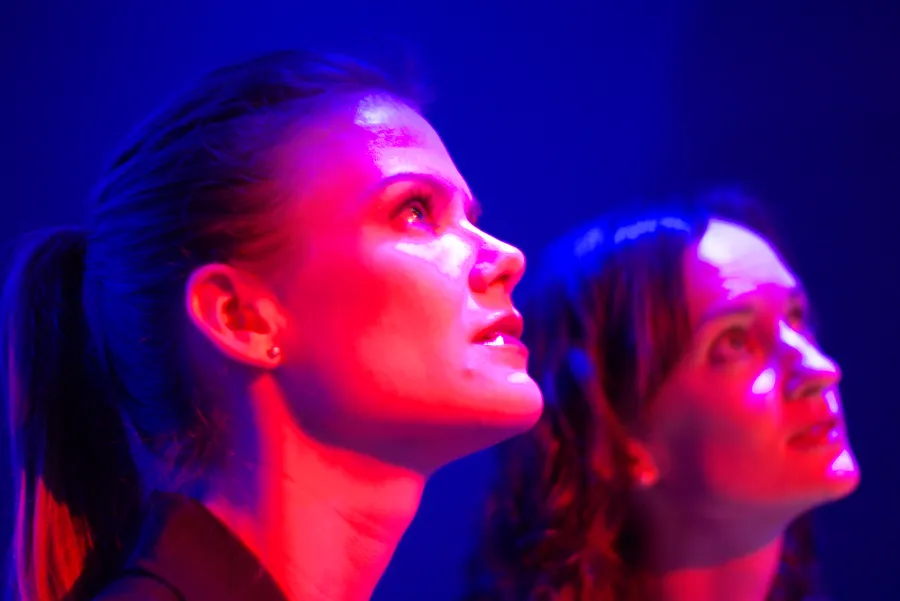 Stephanie and Jen watching the mothership land. Actually, we were at a fashion show.